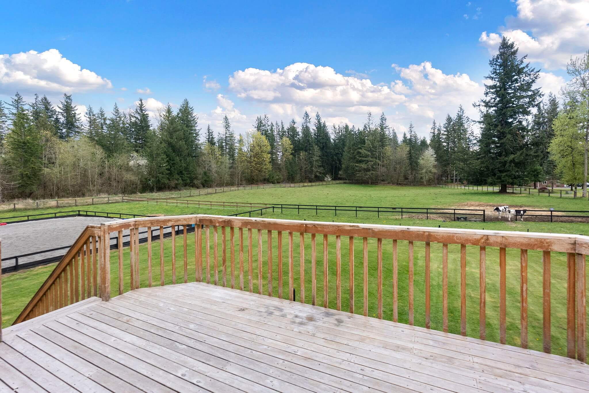 Guest apartment entry deck offers great pasture views