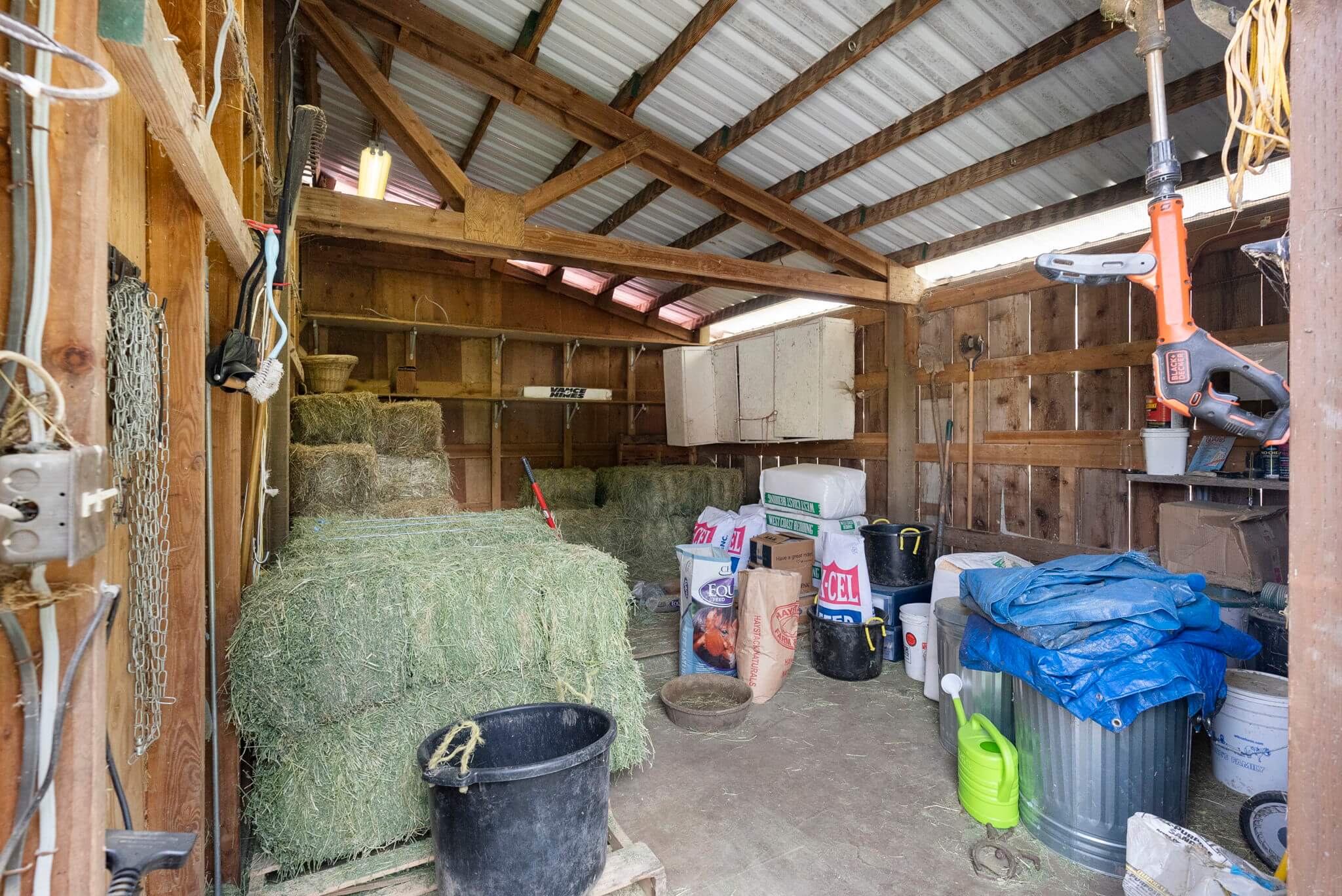 Each smaller barn has its own feed and tack room
