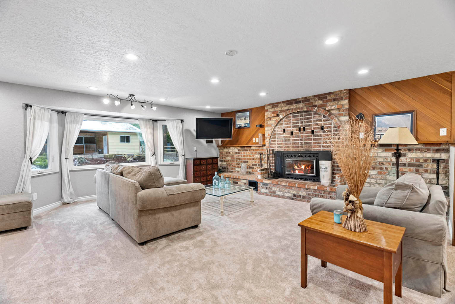Spacious family room with wood-burning fireplace