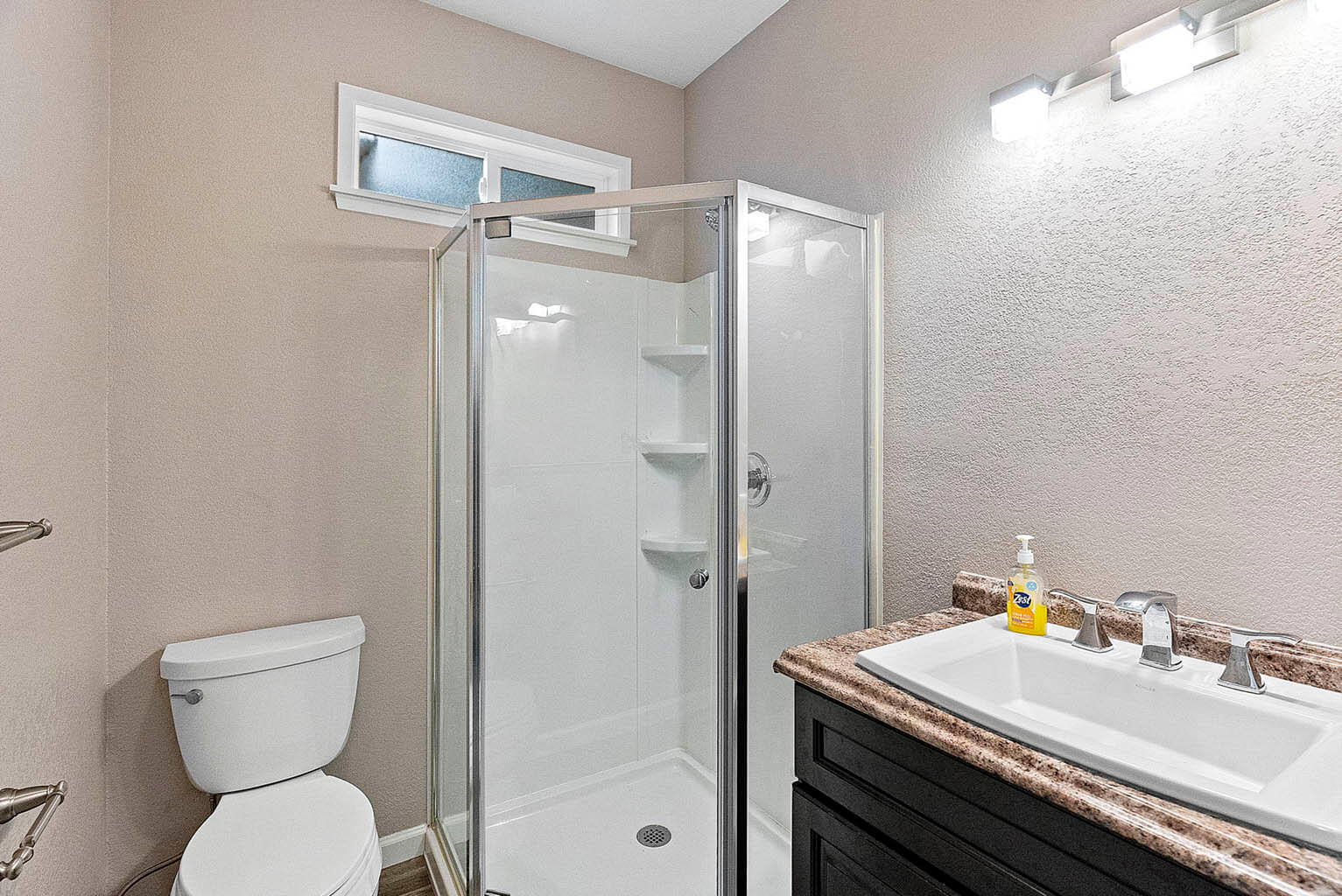 Guest apartment includes a bathroom with shower